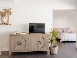 Living room with view to bedroom