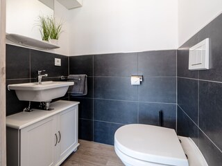 Gäste WC im Erdgeschoß Strand Hus by Seeblick Ferien ORO