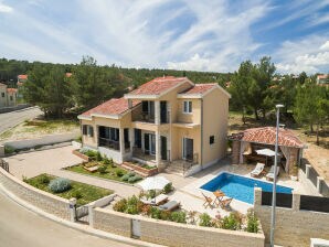 Villa fronte mare Noa con piscina riscaldata