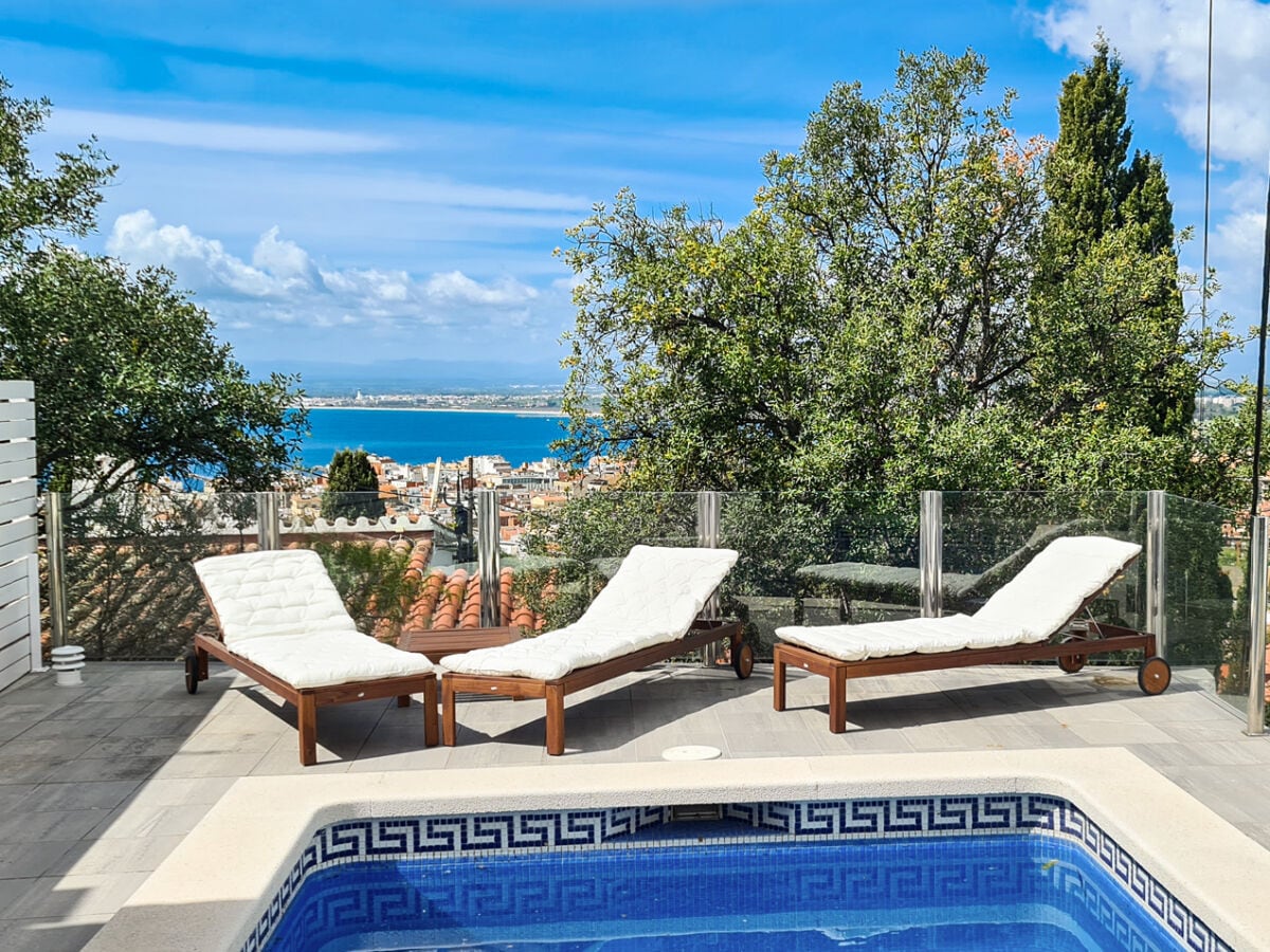 Sun loungers by the pool