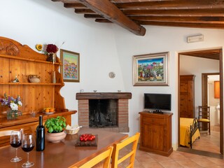 Unit 2 ktichen-dining area leading to bedroom