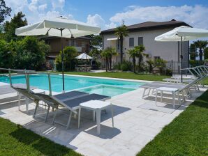 Holiday house Wohnung in einer Villa nur wenige Meter vom Gardasee entfernt - Mattarena - image1