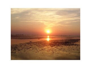 Sonnenuntergang im Watt