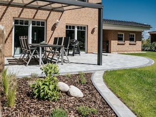 Überdachte Terrasse, hier lässt es sich leben!