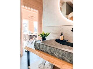 Natural stone sinks in the bathrooms