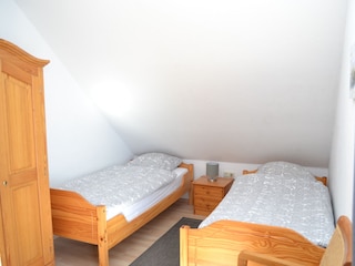 Schlafzimmer mit Einzelbetten