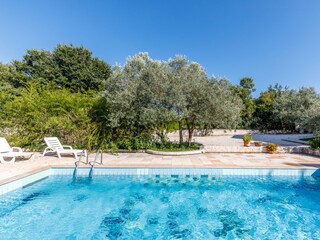 Sunloungers and Entrance to the private Pool