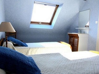 Bedroom in the first etage with 2 single beds