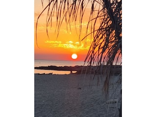 Sonnenuntergang , Aufnahme in einer kleinen Strandbar