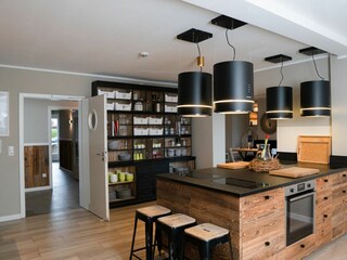 Die Küche und das Wohnzimmer der Ferienanlage stehen allen Gästen gemeinschaftlich zur Verfügung.