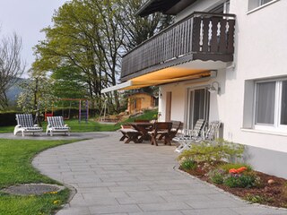 Terrace area with sauna in background