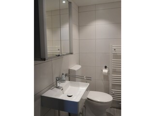 Badezimmer mit Waschmaschine