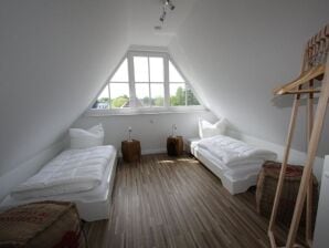 Reet- Ferienhaus "Hus Hanbutt"