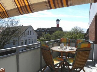 Auf dem Balkon  mit Blick auf den Alten Leuchtturm.