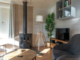 Die Sitzecke mit Kaminofen und Digital TV