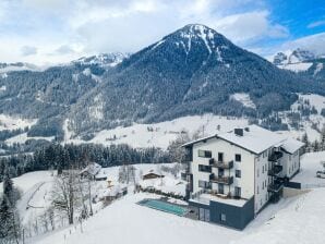 Parc de vacances Appartement avec piscine à débordement partagée - St.Martin am Tennengebirge - image1