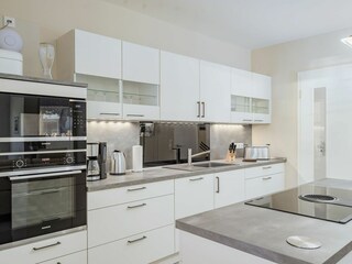 Küche mit Kochinsel - Innenbild