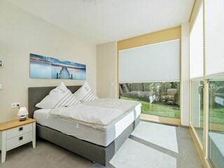 Integral Immobilien: Dein Darß Urlaub Born - Lichtdurchflutetes Schlafzimmer 1 der Ferienwohnung ...