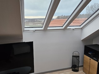 The living room/ Tv room, with a great view