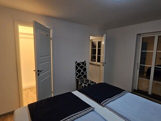 Bedroom 1, with a walking closet, bathroom and terrace.