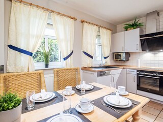 Essbereich mit Küche - Innenbild