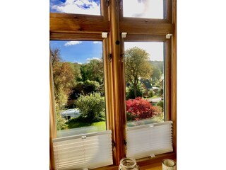 Bedroom view of lake & parking space