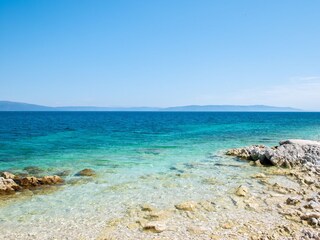 Strand, kristallklares Meer