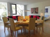 Living room with dining table for 6-8 persons