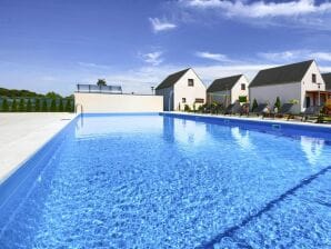 Parc de vacances Maisons de luxe avec piscines pour 6 personnes non loin de la plage de Rogowo - Dźwirzyno - image1