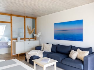 Wohnzimmer mit Schlafsofa