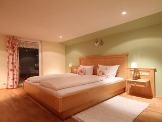 cozy bedroom with TV