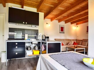 Wohnzimmer mit Küchenblock