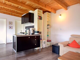 Wohnzimmer mit Küchenblock