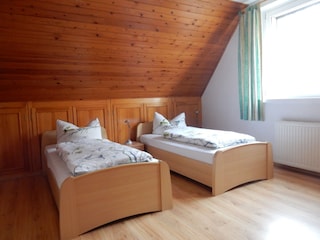Bedroom 2 with 3 single beds