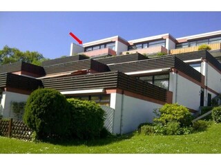 Secluded south-facing balcony with awning