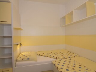 Kinderzimmer für zwei Kinder mit Meerblick