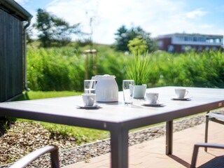 genießen Sie die Sonne auf der Terasse in vollen Zügen