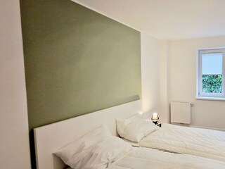 Schlafzimmer mit Doppelbett