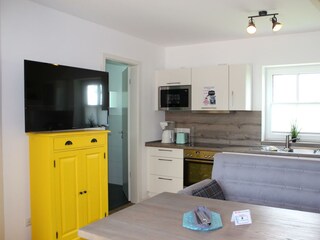 Sitzbereich und Küchenzeile