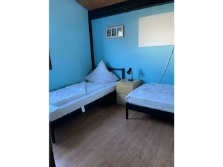 Schlafzimmer mit Einzelbetten