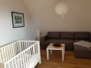 Schlafcouch im Doppelbettzimmer