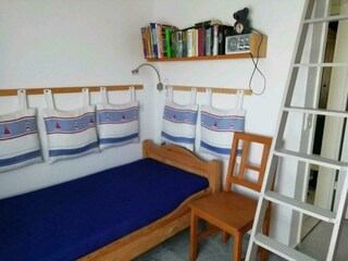 Dreibettzimmer.