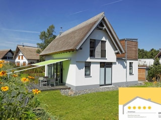 Gartenansicht des Strandhauses