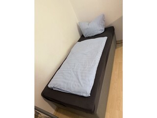 zusätzliches Bett im Wohnzimmer