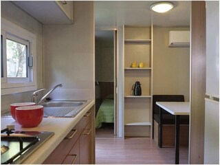 Küche mit Wohn-Essbereich