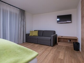 Schlafzimmer 1 Apartment Wiedersbergerhorn