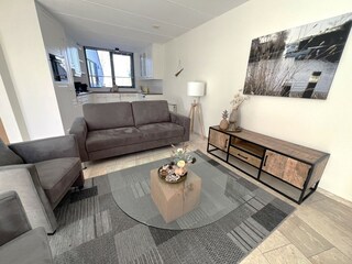 Wohnzimmer mit offene Kueche