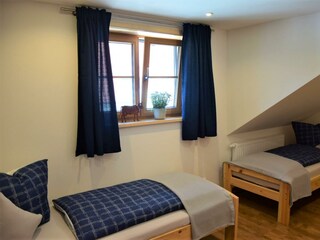 3 Einzelbetten im Schlafzimmer