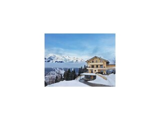 Holzhackerin Apartmenthaus Schladming