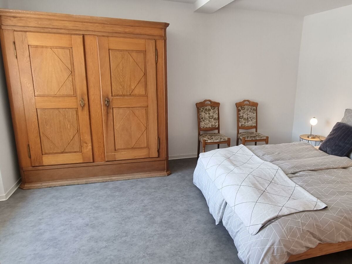 Michel_Living_Ferienwohnung_Sonne_Schlafzimmer2023